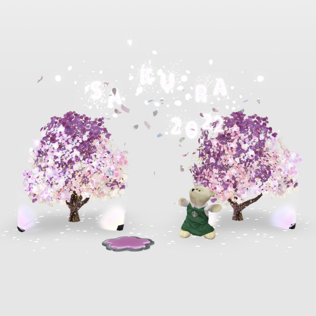 ライトアップされた夜桜とベアリスタの画像